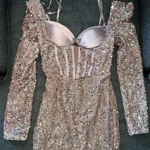 Size M dress. Sequin. Tags still on. Has a little stretch. KimCine.